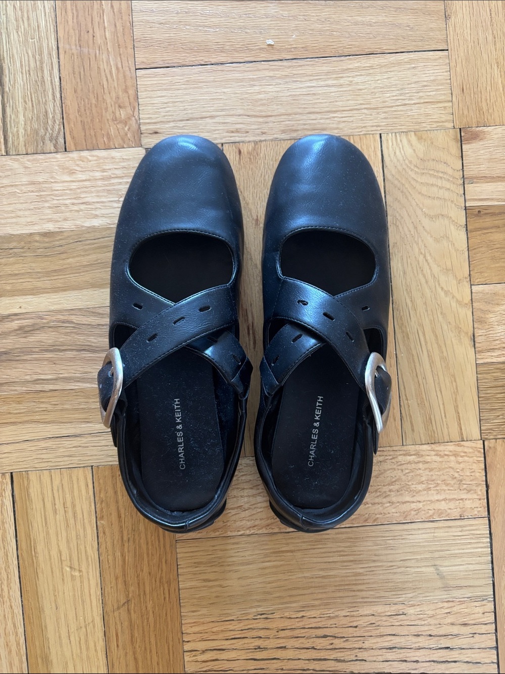 Charles & Keith Black Cross-Strap Mary Jane Shoes with Silver Buckles